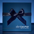 Navy circular logo with text that reads free gift with purchase